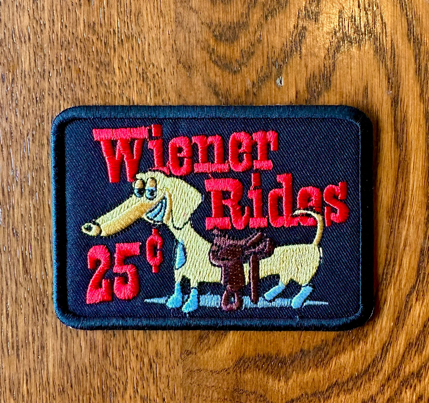 Wiener Rides Wiener Rides 25¢ Patch - Black – Rusty Lids